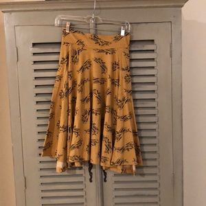 Yellow airplane patterned skirt